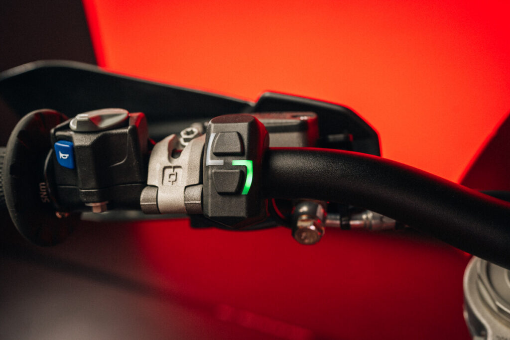 Part of the GASGAS EC300 GP's handlebar and throttle.