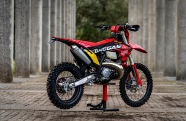 Red GASGAS EC300 GP on a stand.