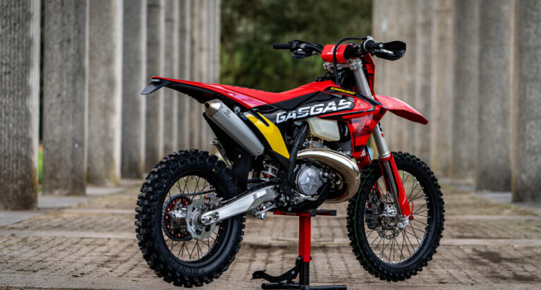 Red GASGAS EC300 GP on a stand.